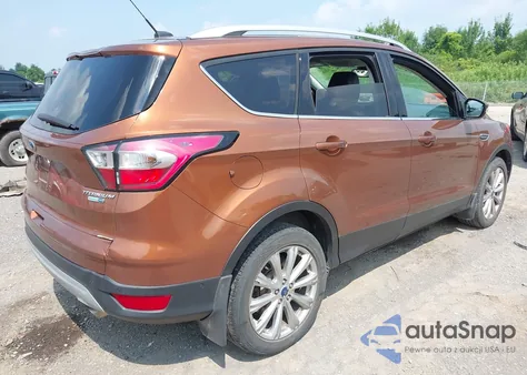 2017 Ford Escape Titanium from USA, damaged, VIN 1FMCU9J98HUD99775